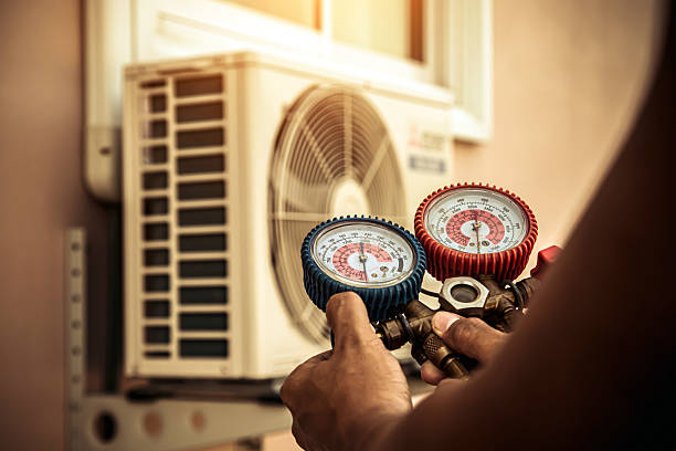 Professional Heat Pump Repair technician working in Somers, NY